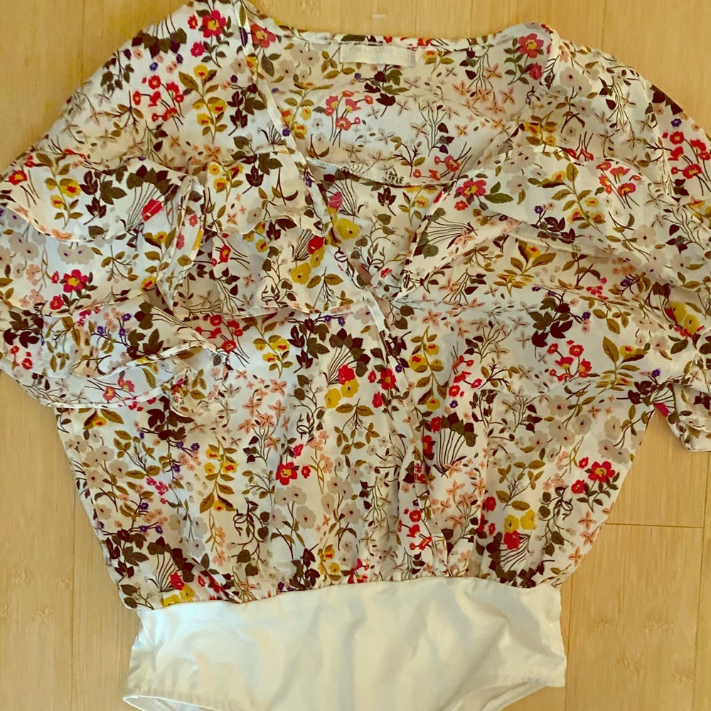 Colorful bodysuit with ruffle detail